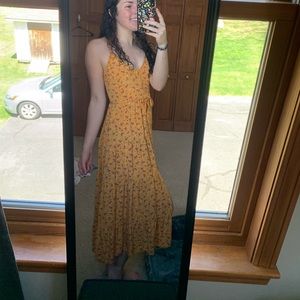 Yellow maxi dress with red flowers